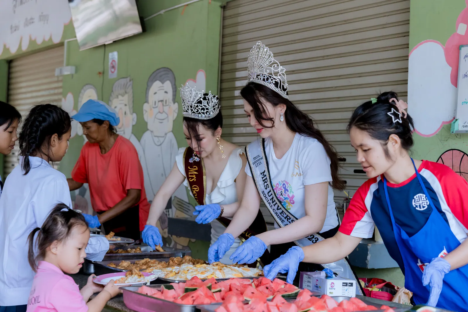 Volunteers serving a shared meal